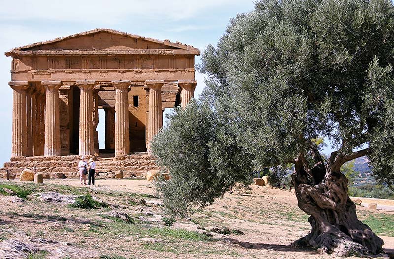 Walking tour group at Greek temple in Agrigento, Sicily